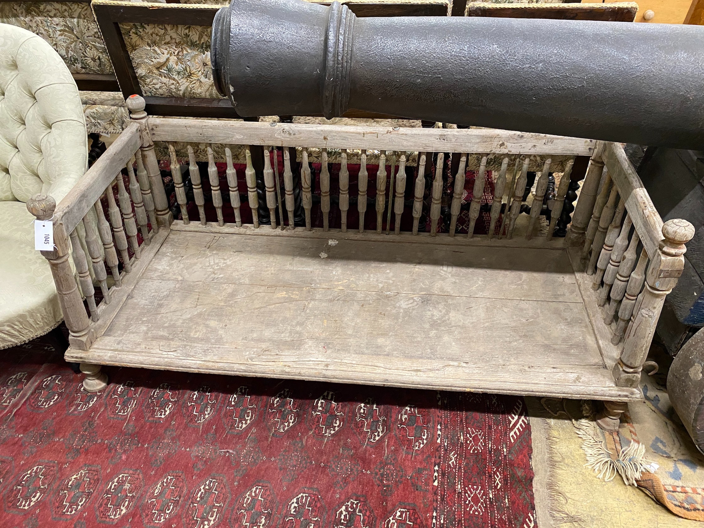 An Indonesian bleached wood low bench seat, length 142cm, depth 62cm, height 62cm